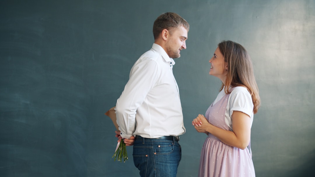 Woman excited to receive flowers from partner